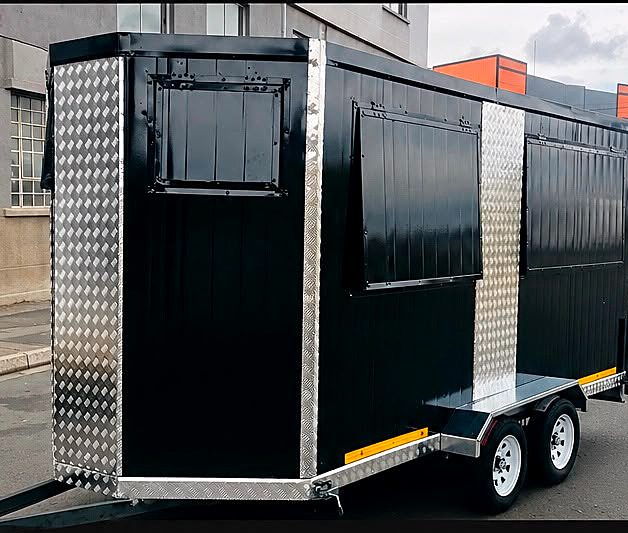 Phenom premium black food trailer, the flagship double axle unit